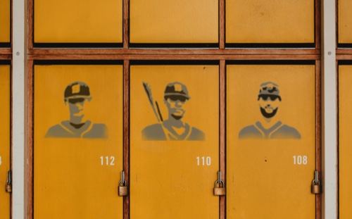 Baseball team faces stenciled on locker doors